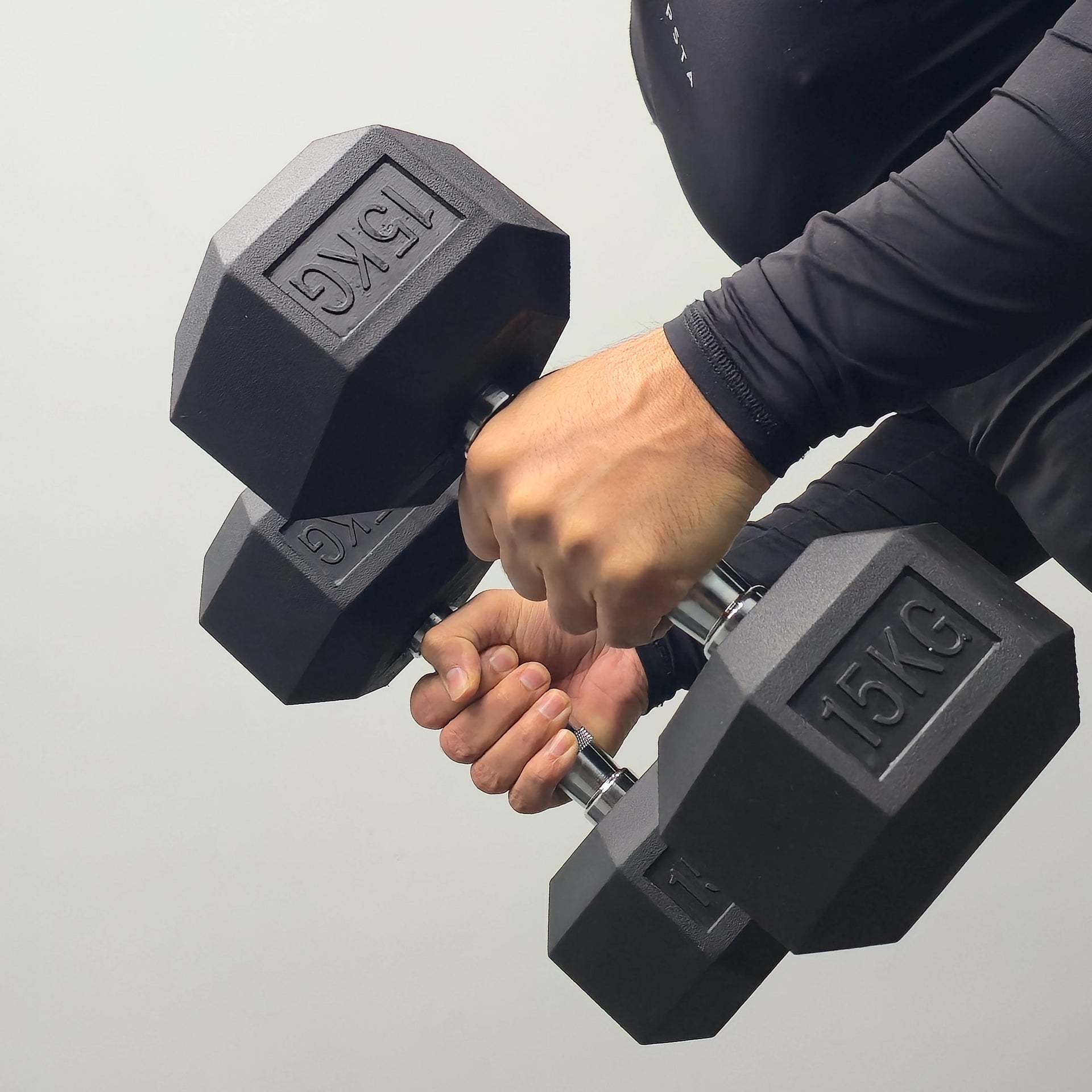 pair of 15kg hex rubber dumbbells