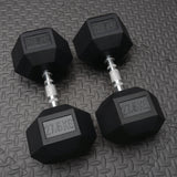 27.5g rubber hex dumbbells in pairs on a textured flooring