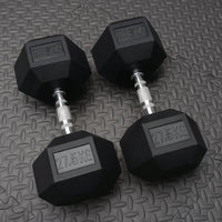 27.5g rubber hex dumbbells in pairs on a textured flooring