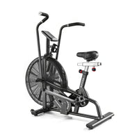 Black exercise bike with fan on a white background